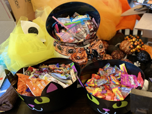 black bowls filled with leftover halloween candy