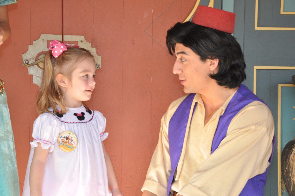 Harper's "First Visit" badge earned her some extra attention from Aladdin.