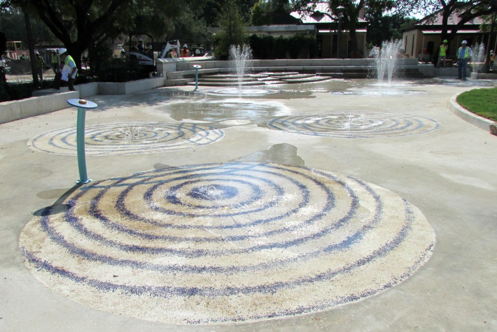 Blue mosaic spirals decorate the splash pad at Yanaguana Garden in Hemisfair | Alamo City Moms Blog