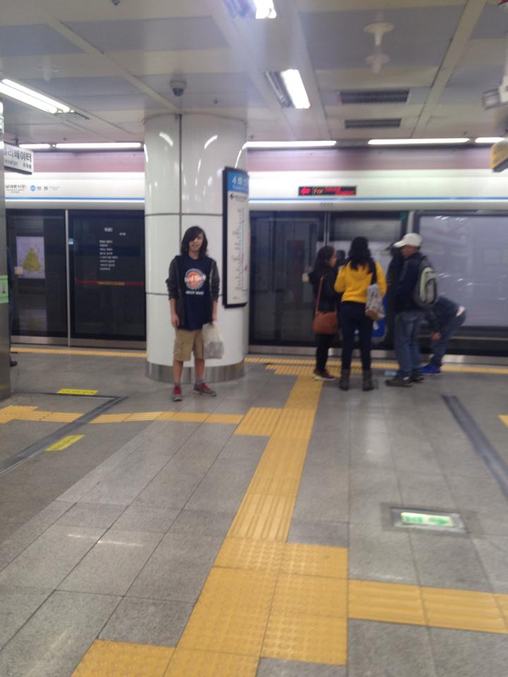 Marci riding the subway home in Seoul by herself as we went in the opposite direction.