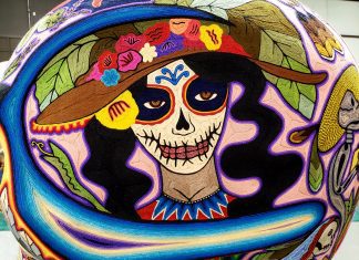 colorful artwork showing a skeleton for day of the dead