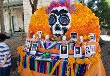a colorful altar celebrating day of the dead