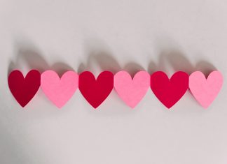 red and pink paper hearts by Kelly Sikkema