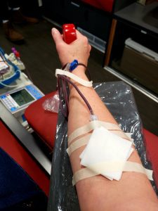 an arm giving blood