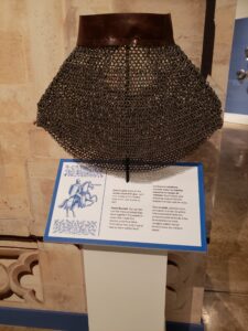 an example of chain mail on display for children to touch 