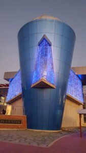 Scobee planetarium looks like a blue rocket headed into space night image