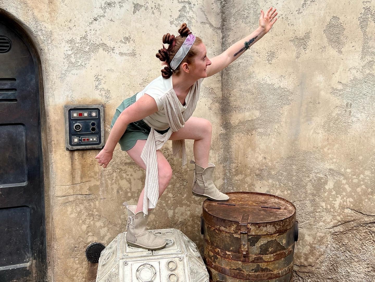 White women climbing containers in Star Wars: Galaxy's Edge