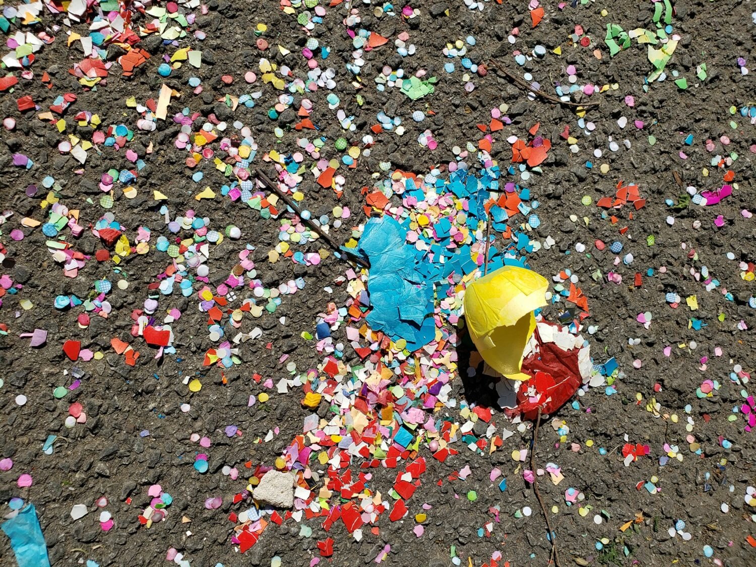 confetti and broken eggs on the ground